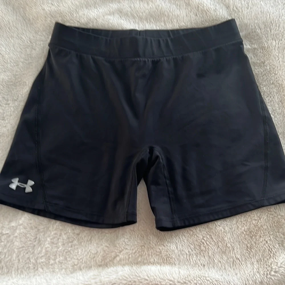 Under Armour black athletic shorts in L size.‎